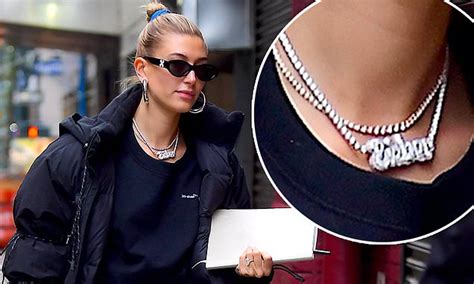 Hailey Baldwin Bundles Up In A Down Jacket As She Proudly Wears Her Diamond Bieber Necklace In