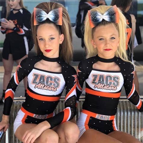 Pin By Angel Beck On Cheer Hair Don T Care Cheer Outfits