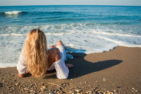 Blonde Lying On The Beach And See To The Ocean Stock Image Image Of Blonde Blue