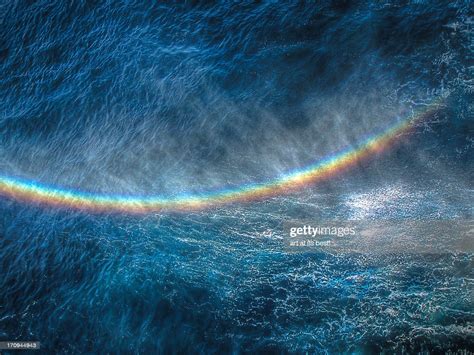 Rainbow Over Water High Res Stock Photo Getty Images