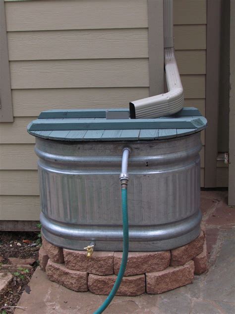 Metal Rain Barrels To Use One Simply Remove Your Gutters Downspout And Fasten The Rain Chain
