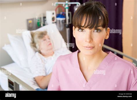 Nurse Standing In Patients Room Stock Photo Alamy