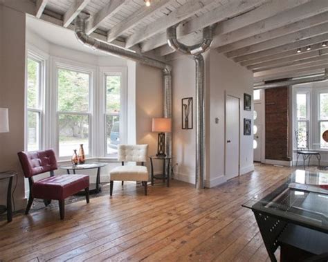 Hanging exposed beams over the finished sheetrock defines your ceiling area and adds a finishing make the beams run perpendicular to the underlying ceiling joists. Exposed Joists Ideas, Pictures, Remodel and Decor