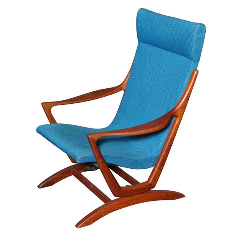 The most common danish rocking chair material is wood. Danish Modern Teak and Blue Rocking Chair