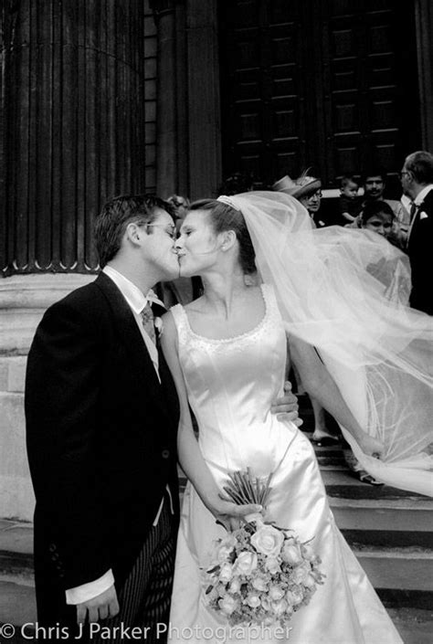 Bride And Groom Kiss Outside St Pauls Cathedral Capture The Moment With