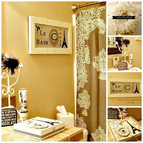 A contemporary parisian bathroom with an oval tub, artworks, white marble tiles and a geometric floor. The Answer Is Chocolate: My Paris Bathroom: Bathroom Makeover Using What You Already Have