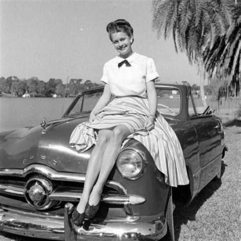 Woman Posing On The Hood Of A Ford Convertible Random