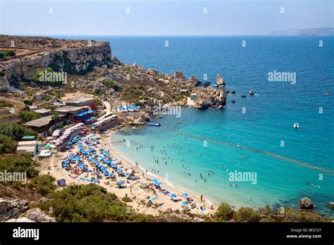 People At The Beach In A Little Bay Paradise Bay Malta Europe Stock