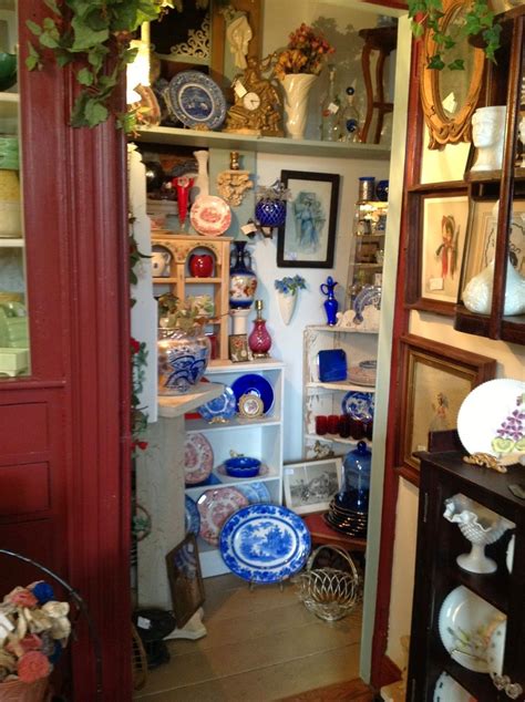 A Room Filled With Lots Of Different Types Of Plates And Vases On