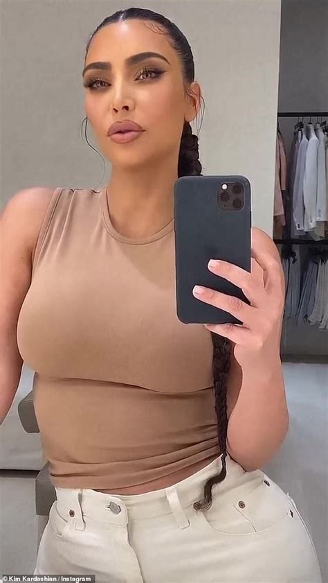 Kim Kardashian Goes Braless As She Puts Her Famous Curves On Display In