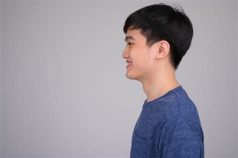 Premium Photo Profile View Of Young Happy Asian Man Smiling