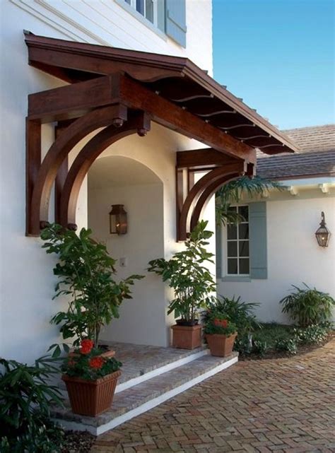 Make an entrance with a brackenwood front door. 40 Lovely Door Overhang Designs - Bored Art