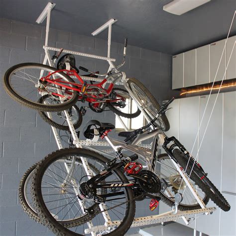 This black ceiling bike lift uses a rope and pulley system that is mounted to the top of. Motorized Storage | Product categories | The Garage ...