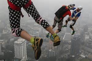 Base Jumpers Dressed In Superhero Outfits Leap 421m From Kuala Lumpur