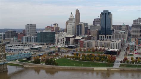 5 7k stock footage aerial video ascend and approach city skyline from the ohio river downtown