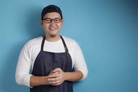 Happy Proud Asian Chef Or Waiter Smiling At Camera Stock Photo Image