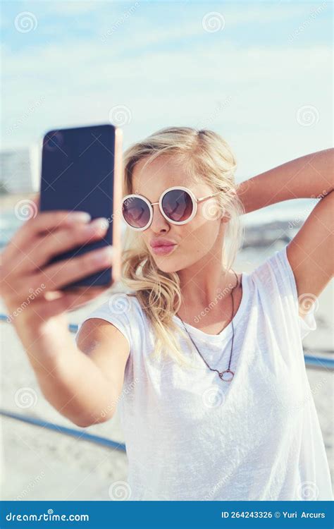 Summer Selfies Are My Favorite A Young Woman Taking A Selfie While