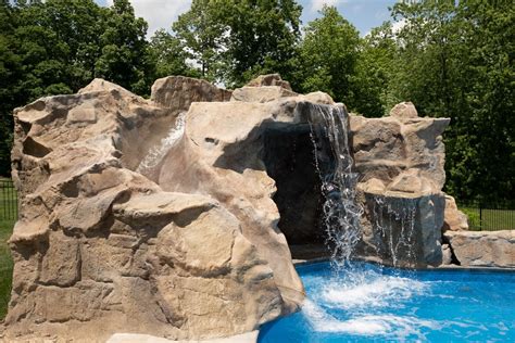 Poolside Water Features Rock Water Slides Waterfalls Grottos Oasis Outdoor Living