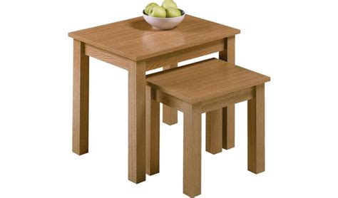 Made from slender, tempered glass, the tables have a minimalist design and complement a variety of home decors. Buy Habitat Nest of 2 Tables - Oak Effect | Nest of tables ...