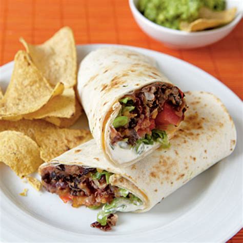 Vegetarian Burritos With Spanish Rice Salsa And Guacamole Delishably