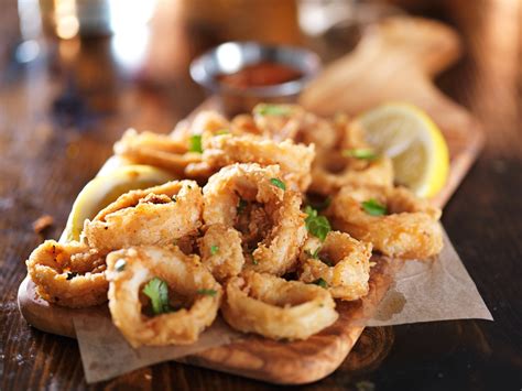 1 slice squid in half just below the eyes, separating the. Come cucinare i calamari