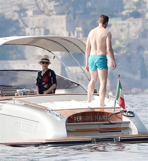 Kylie Minogue Flaunts Her Bum In Cut Out Swimsuit In Italy Daily Mail Online