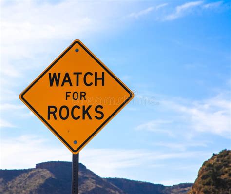 Falling Rock Sign Next To The Road Stock Image Image Of Drive