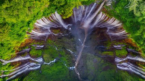 Aerial View Of Tumpak Sewu Waterfall In The Tropical Forest At Lumajang