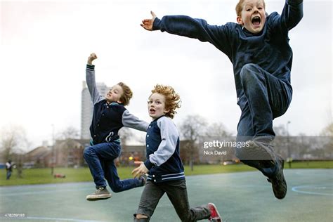 Children Playing In Park High Res Stock Photo Getty Images