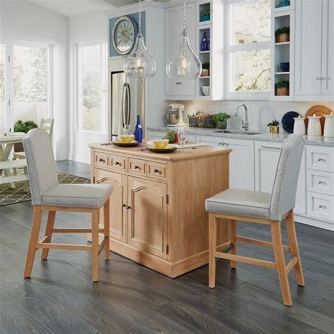 Create a portable kitchen island to increase counter space and convenience in your kitchen. Home Styles Dolly Madison White Kitchen Cart With Natural ...