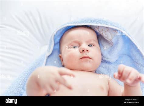 Newborn Cute Baby Looks Alert And Awake Stock Photo Alamy