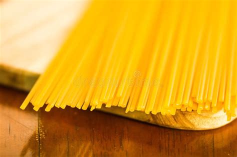 Closeup Pile Of Dry Spaghetti Yellow Color And Great Detail Stock