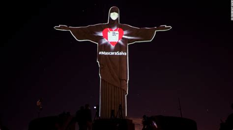 Christ The Redeemer Statue Had A Face Mask Projected Onto It Cnn Travel