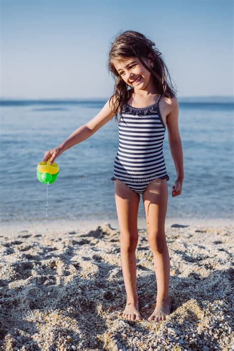Cute Little Girl Playing On The Beach Stock Image Image Of Leisure