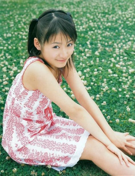 photo medium 1girl asian dress female focus japanese nationality outdoors sitting