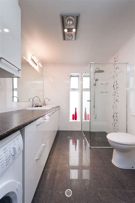 This floor plan divides the bathroom into four sections, separated by a wall divider or glass panel. Laundry & Bathroom combo design #brilliantsa #laundry # ...