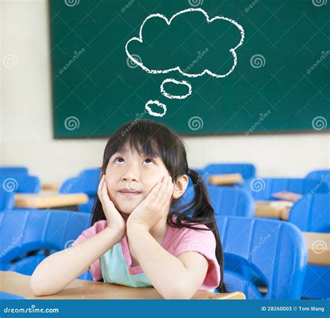 Little Girl In The Classroom With Thinking Royalty Free Stock Photo