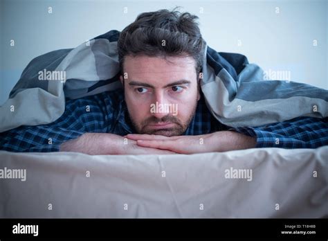 Man With Sleep Disorder Lying In The Bed Stock Photo Alamy
