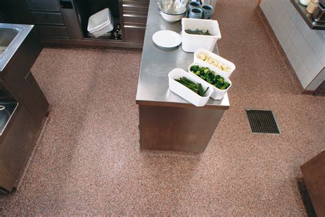 Flooring in these type of kitchens take way more abuse that the normal home kitchen as number of staff maneuvering around the kitchen is far greater in numbers. commercial kitchen epoxy floor coatings tko concrete nashville