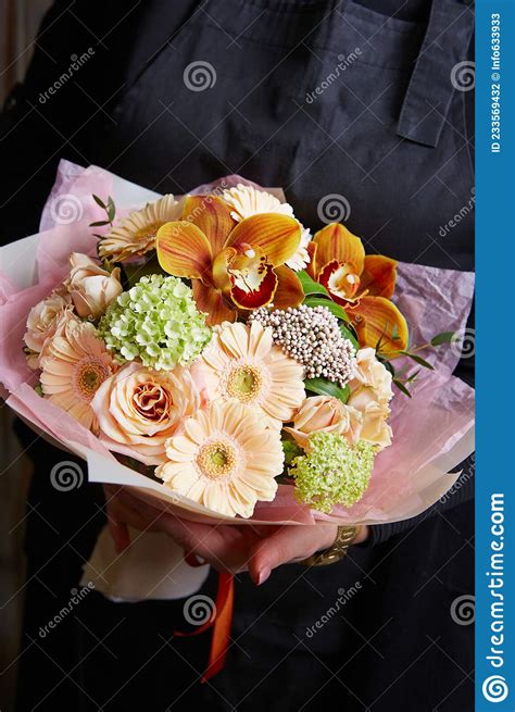 Woman Holding A Beautiful Colourful Blossoming Flower Bouquet Fresh