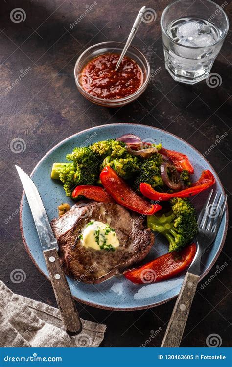 Grilled Beef Steak With Garlic Butter And Vegetables Meat With Stock