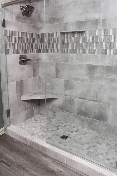 grey tiled shower with accent tile strip and niche bathroom remodel shower bathroom redesign