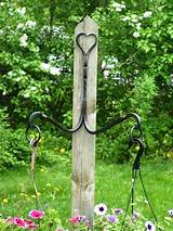 Wrought iron plant hangers for flower baskets and flower pots. Custom Wrought Iron Double Plant Hanger by Hawley's Fine ...