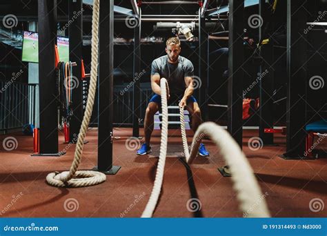 Fitness Man Working Out With Battle Ropes At Gym Stock Image Image