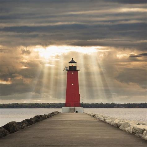 Manistique Lighthouse And Sunbeams Manistique Michigan 14