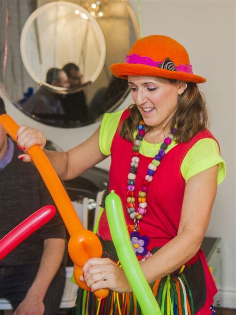 Jojo The Balloon Twister Entertaining The Children At A Party In