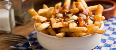 Poutine Traditional Potato Dish From Quebec Canada Tasteatlas