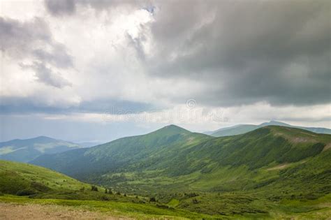Sharp Green Mountain Peaks And Sky With Dramatic Clouds Landscape Stock
