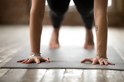 Struggling with your ability to do push ups? Woman Doing Push Ups Or Press Ups Exercise Closeup Stock ...