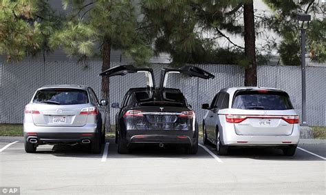 Tesla Launches Its Model X Electric Suv With Falcon Wing Doors